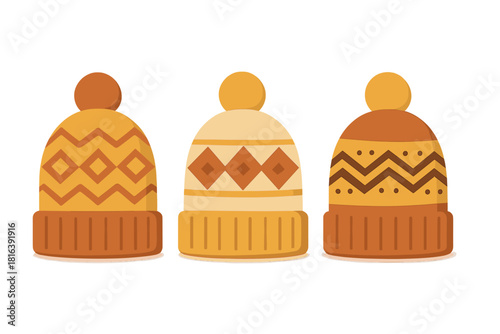 Three knitted winter hats with pom-poms and colorful geometric patterns
