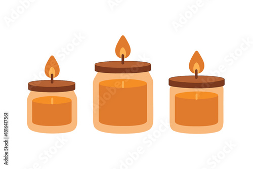 Three glowing orange scented candles in glass jars with brown wooden lids