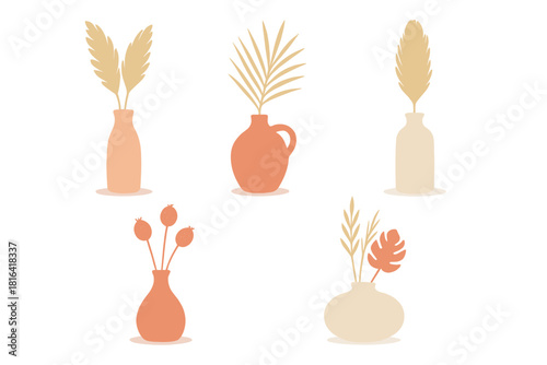 Minimalist terracotta vases with dried pampas grass and tropical leaves collection