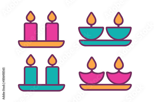 Colorful lit pillar candles and traditional Indian diyas on decorative trays