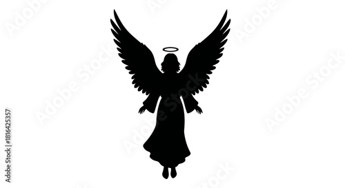 Silhouette of an angel with wings and halo