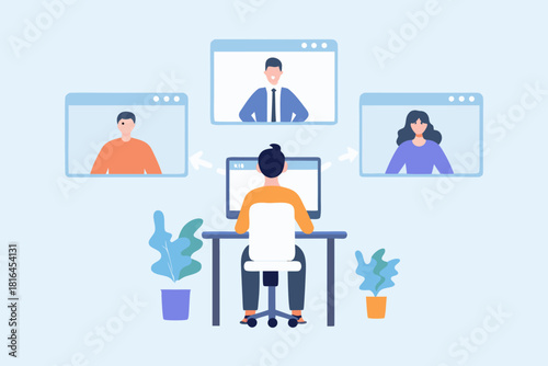 Person on computer having a video conference call with colleagues in separate windows