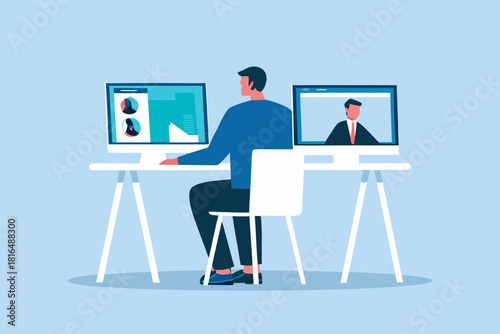 Man working from home using multiple monitors for video conference