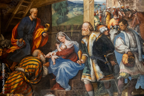 Painting (19th century) of Christmas Nativity Scene : Adoration of the Magi as they present gifts of gold, frankincense and myrrh to the Infant Jesus.