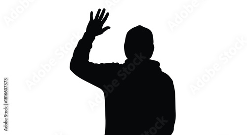 Silhouette of a person waving
