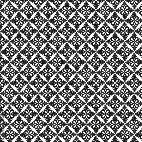 Intricate black and white geometric floral pattern repeating seamlessly across the entire image surface