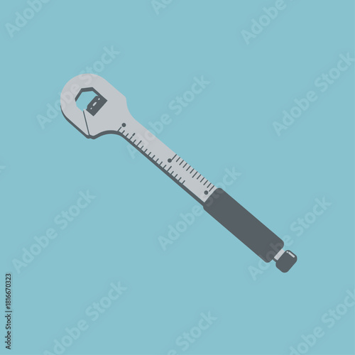 Illustration of a grey multi-tool combining a wrench, bottle opener, and ruler on a light blue background.