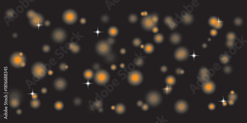 Soft Golden Bokeh Lights on Black Background with Sparkle Effects