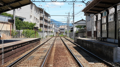 The old railway through the little town in the city