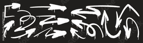 Graffiti arrow set with bold dripping spray-paint strokes. Urban street-style markers for dynamic graphic design. Expressive hand-drawn direction symbols for creative artwork.