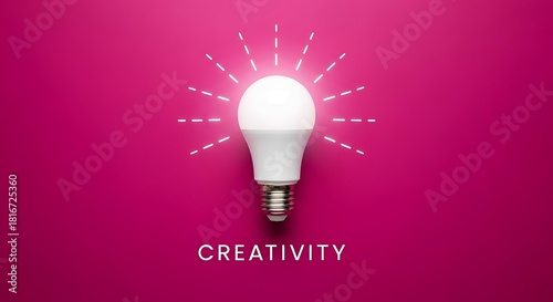 A bright led light bulb radiates creativity on a vibrant pink background, symbolizing innovation and ideas
