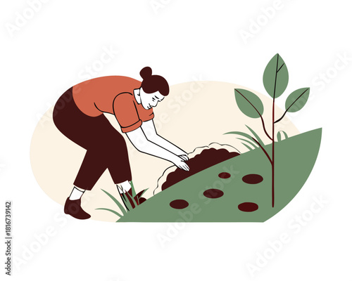 Woman digging a hole in the ground for planting a tree seedling