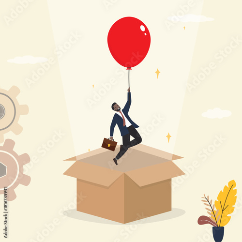 Businessman, thinking outside the box. Business and Successful concept. Entrepreneur holding red balloon and flying up from cardboard box. Startup, success, new project.