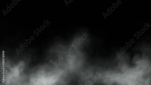 Dense fog drifting across a dark black background, creating a mysterious, atmospheric effect with low visibility and abstract formations