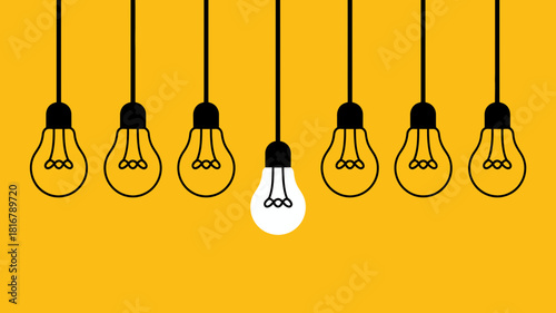 Single bright idea light bulb standing out from a row of unlit lamps, symbolizing creativity, innovation, and effective problem-solving.