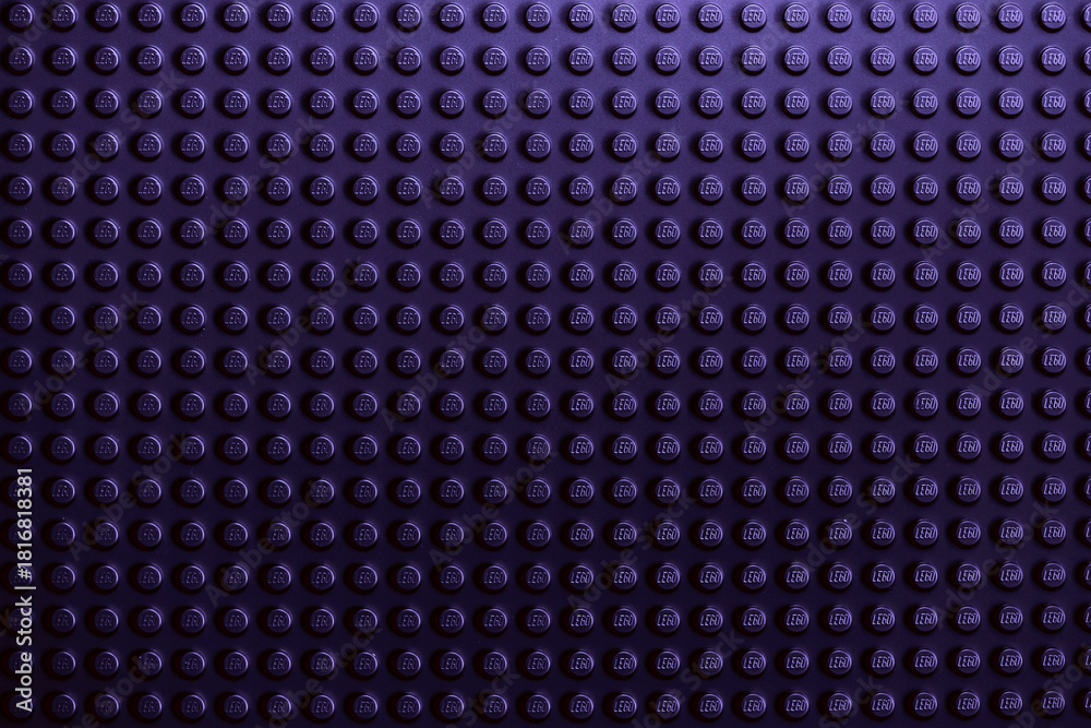 Naklejka premium Deep Violet or Purple LEGO Brick Surface Texture Background