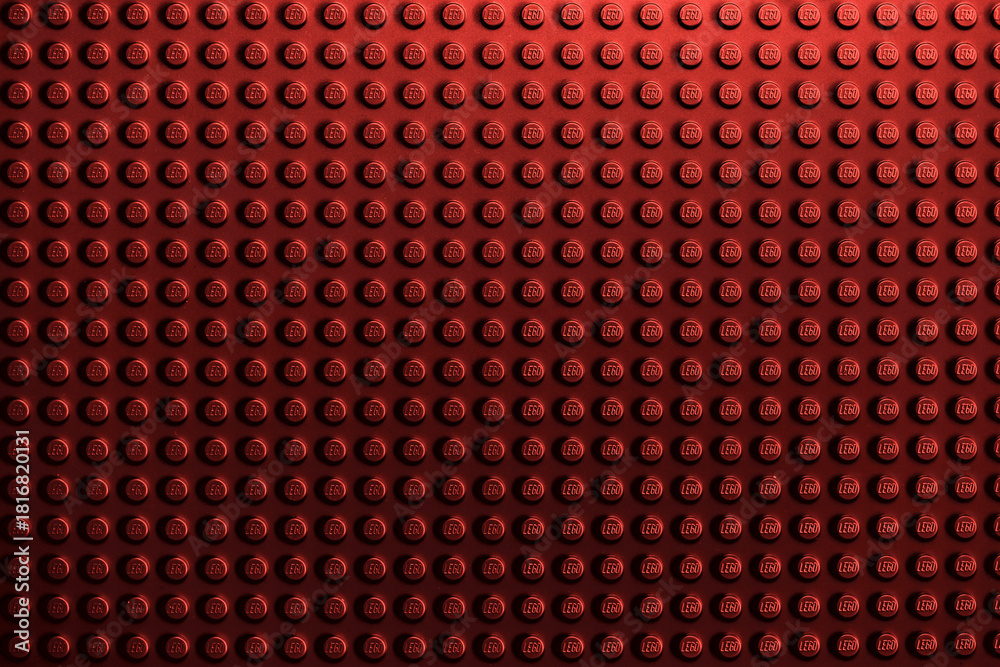 Naklejka premium Red background of the LEGO Classic baseplate