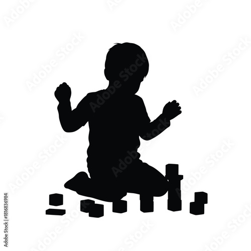 Child playing with blocks silhouette