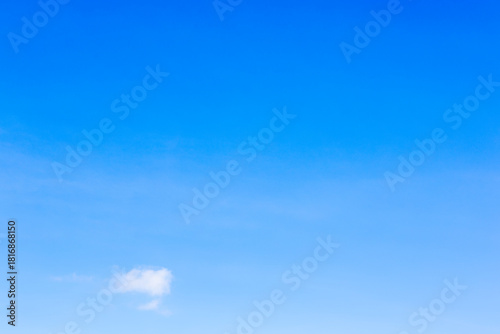 little white cloud in blue sky on sunny autumn day