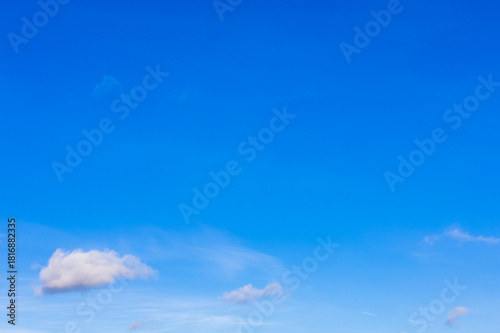 Photography small clouds in clear blue sky on sunny autumn day