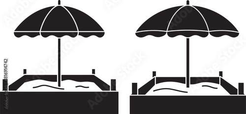 Two sandbox umbrellas silhouette