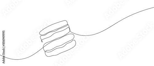 Two stuffed cookies in one continuous line. one line vector illustration Editable stroke.
