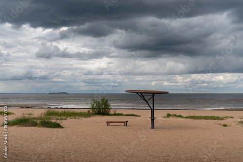 Fototapeta Naklejka Na Ścianę i Meble -  A deserted sandy beach on the Baltic Sea coast on a sunny summer day, Sestroretsk, Kurortny District, Saint Petersburg, Russia