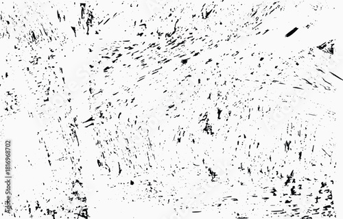 Abstract grunge vector design featuring textured patterns with chaotic lines and scattered brush strokes in black and white tones