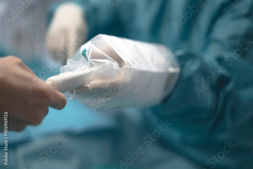Fotografía Healthcare professional using sterile ultrasound probe on patient finger
