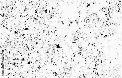 Abstract grunge vector design featuring a textured black and white pattern with random scratches and spots on a light background creating a striking yet subtle visual appeal