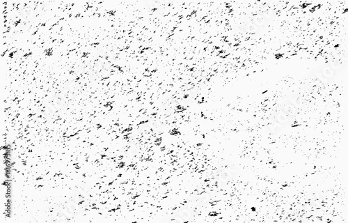 Abstract grunge vector design showcasing textured black and white elements arranged in a scattered pattern for creative backgrounds