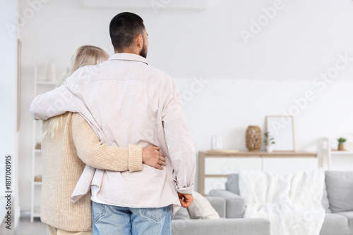Young man hugging his mothe...