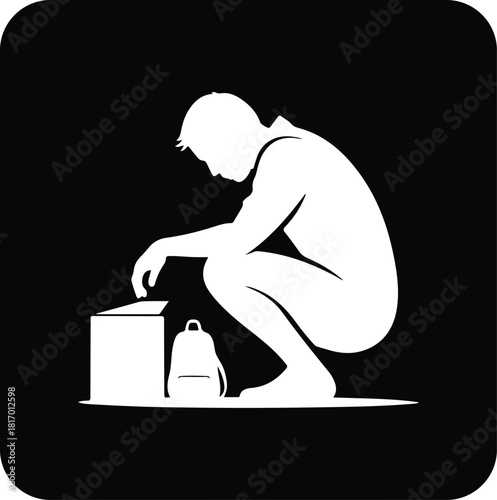 Silhouette icon of a man squatting next to a small bag or object on a dark square background