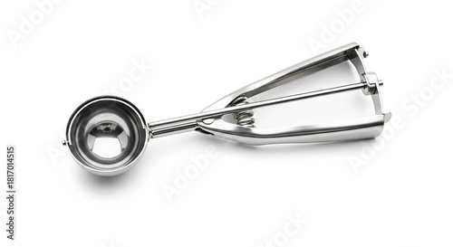 Shiny metal ice cream scoop ready to serve delicious desserts, promising sweet moments and cool treats on a bright summer day, offering easy scooping