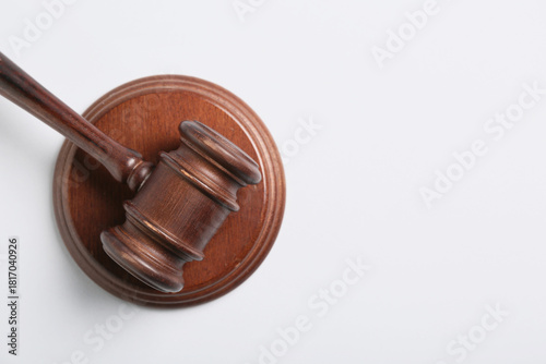 Judge's gavel on white back...