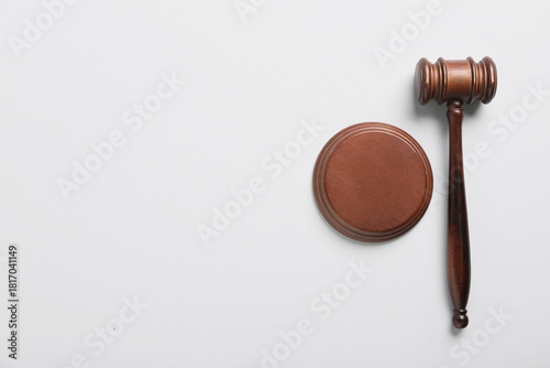 Judge's gavel on white back...