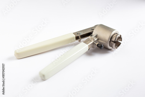 A manual vial crimper tool used to seal aluminum caps onto glass autosampler vials. Essential equipment for securing samples prior to chromatography analysis in a laboratory.