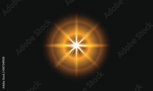 Bright golden starburst light effect on dark background