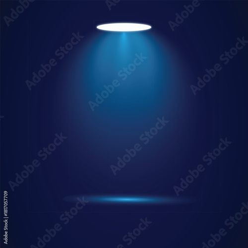 Bright blue spotlight illuminating a dark stage 