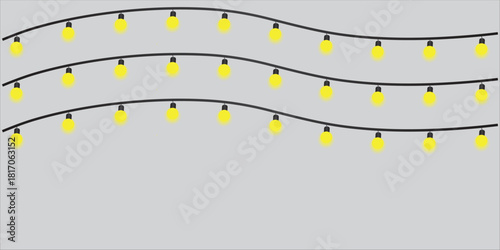 Decorative yellow light bulbs on wavy strings against a light blue background