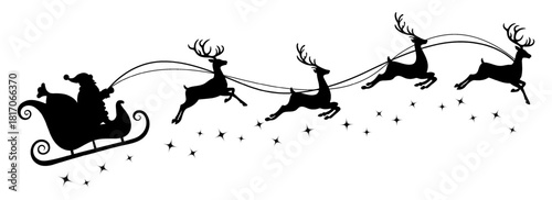 Santa Claus rides in a sleigh in harness on the reindeer