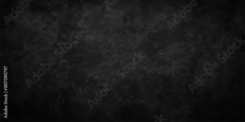 Dark grunge wall texture backdrop with copy space, featuring an old, rough, black, and gray concrete surface design