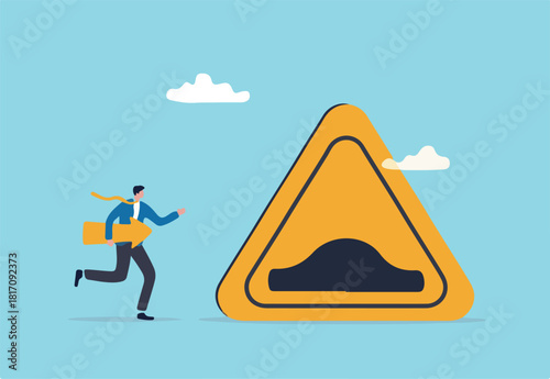 Business slow down due to obstacles, difficulty or speed limit, beware of crisis ahead or recession, economic depression concept, businessman running with arrow to find speed bump slow down sign.