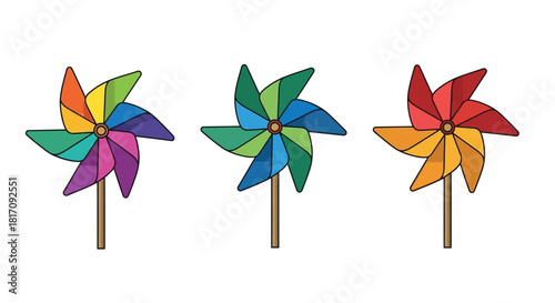 Colorful pinwheels with bright rainbow hues on simple wooden sticks