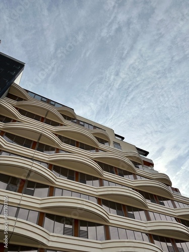Photo of modern building. City and apartment building. Architecture. 