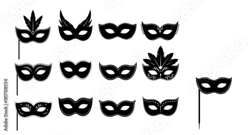 Collection of black masquerade masks with various designs and one feather accent isolated on