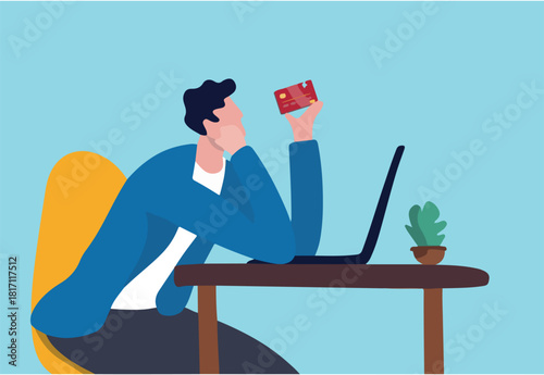 Credit card online payment, e-commerce or internet shopping concept, contemplation man looking at his credit card about to using it to buy things online