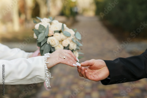 bride and groom holding hands