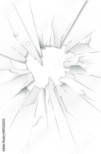 A shattered window with jagged edges and a broken frame