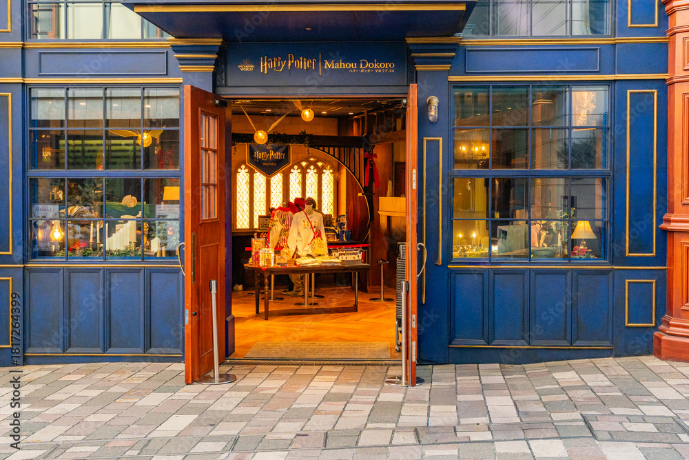 Naklejka premium Tokyo, Japan-December 28, 2024: The entrance of the popular Harry Potter store during the Christmas shopping season.